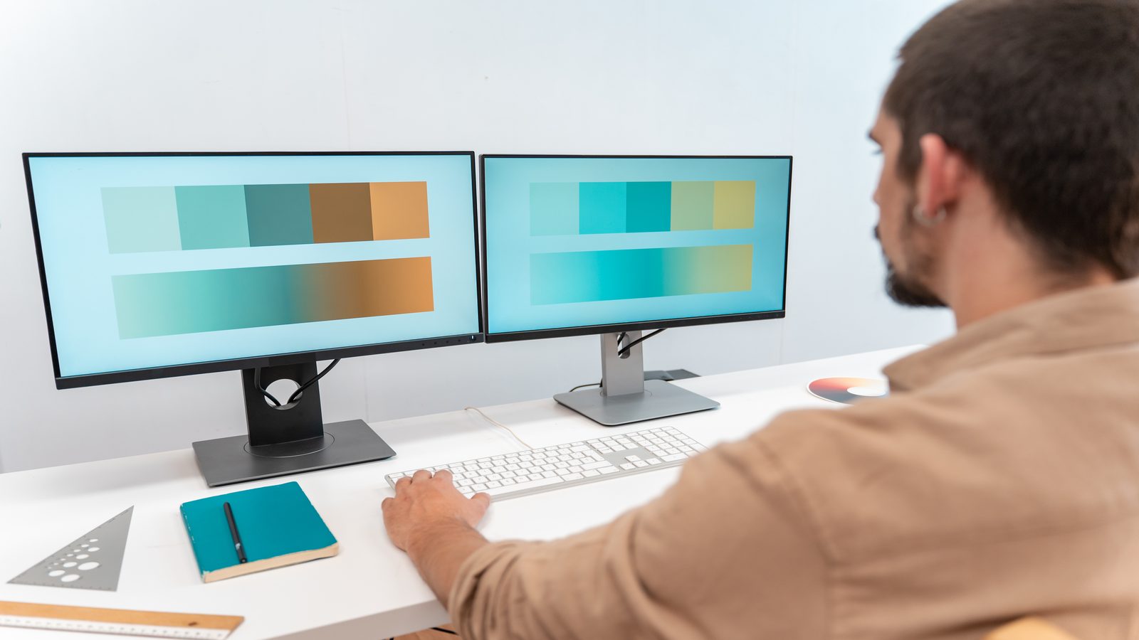 Four desktop website builder interfaces compared side by side showing CoffeeCup Pinegrow Mobirise and DFM2HTML